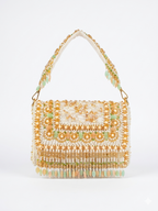 Beaded handbag with floral pattern on a white background